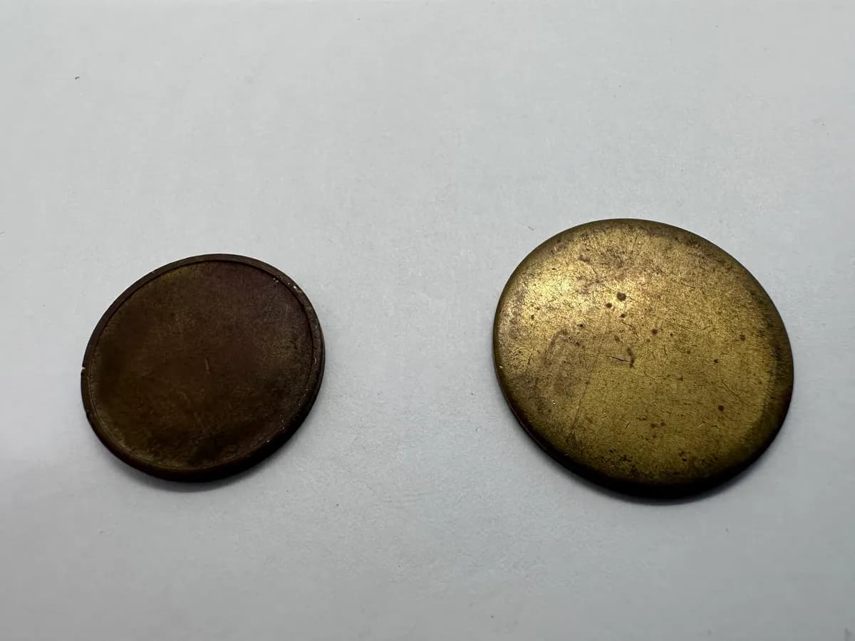 Pair of Unstruck Coin Blanks (Planchets) - Type 1 Flat and Type 2 Rimmed, Brass
